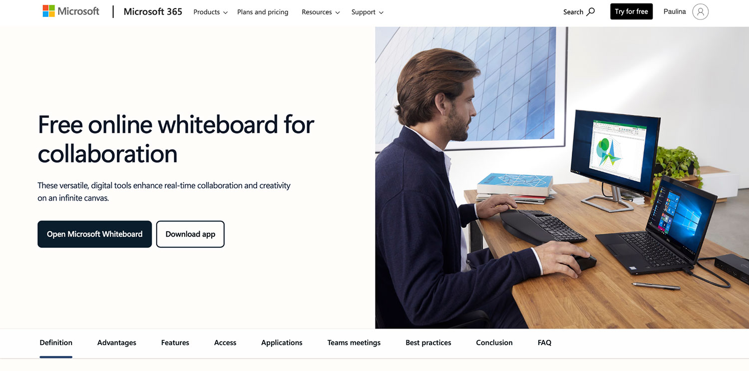 Microsoft Whiteboard homepage with tagline and man working at dual-screen setup.